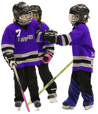 young girls playing a game of ringette